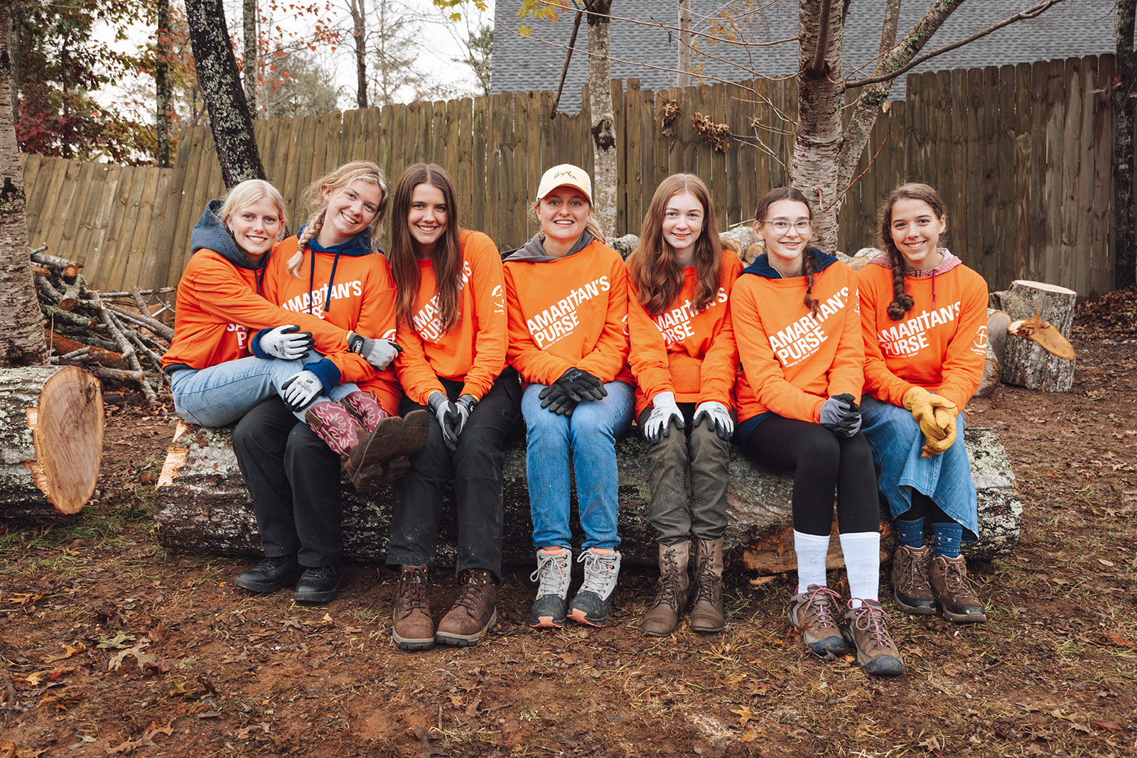 Teens cleaning up after Hurricane Helene